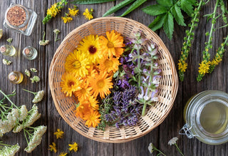 basket-of-flowers-on-a-wooded-table