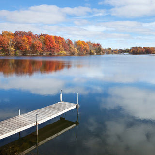 dock-overlooking-a-tranquil-lake-in-autumn
